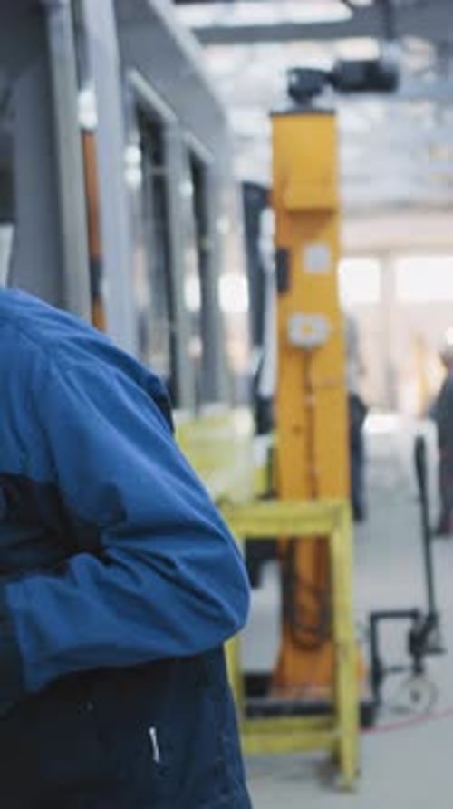 Young Caucasian Engineer Technologist Building Modern City Tram Transport Using Construction Plan