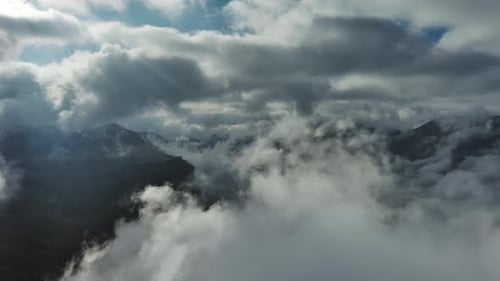 Aerial High View of Dramatic Clouds Flying