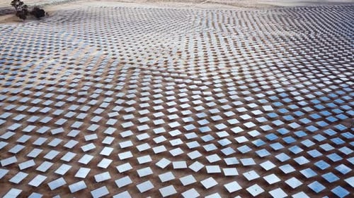 Solar power plant mirrors that focus sun rays upon a collector producing renewable energy