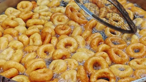 Delicious Traditional Turkish Dessert Lokma Donut Dough Cooking In Oil 9