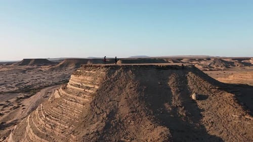 People Walking on a Hill in the Atacama Desert, Chile, The Driest Nonpolar Desert in the World. 4K.