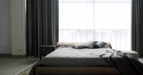 Real Estate. Interior of modern luxury bedroom with furniture.