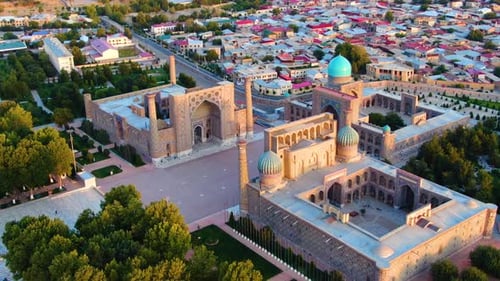 Madrasahs On Registan Square In The City Of Samarkand, Uzbekistan, Central Asia. - Aerial Drone