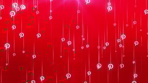 Glowing Pinterest Logo Particles Falling on Red Background
