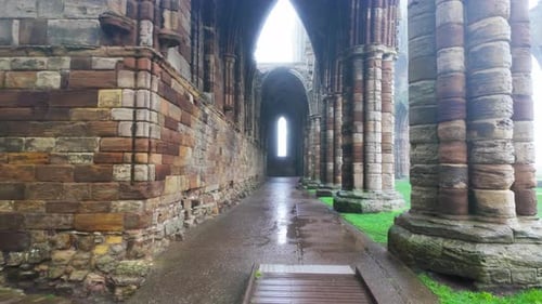 Whitby Abby now derelict and formally a Benedictine abbey and is situated overlooking the sea on the