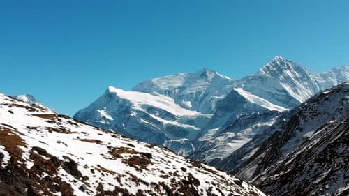 Aerial slider shot of Mount Annapurna three and Ganapurna Himalayas Mountain from Manang Valley, Nep