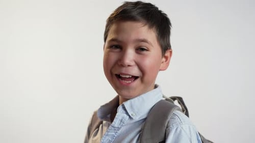 Smiling Boy With Backpack