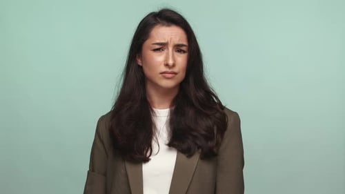 Confused Woman Gesturing with Hands Asking Why