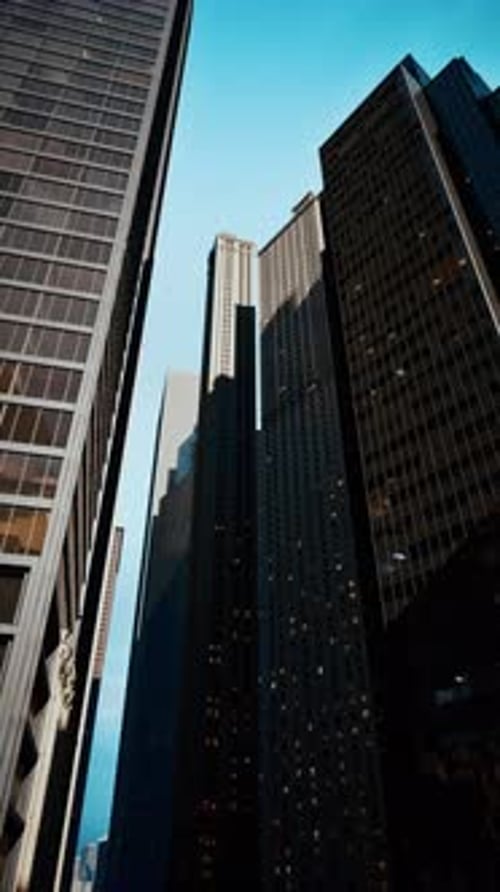 Vertical Upward Pan of Modern City Skyscrapers