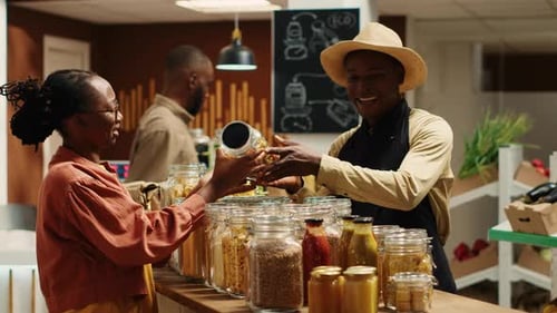 Happy Customer Buying Food in Organic Grocery Store