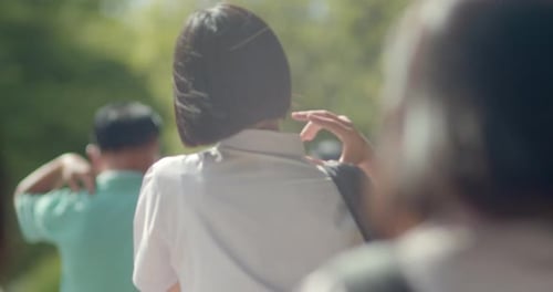 The Asian high school students in white uniforms are going back to school in the morning