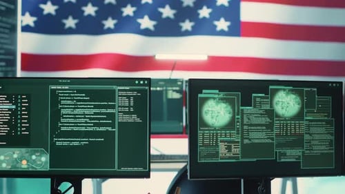 Code on Computer Monitors with American Flag