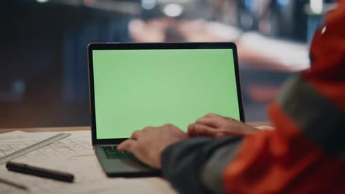 Factory Worker Typing Green Screen Laptop on Plant Workshop Close Up Engineer