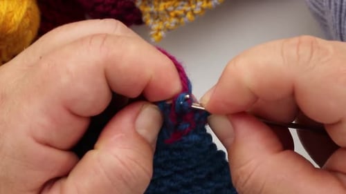 Hands Knitting Colorful Fabric Close Up