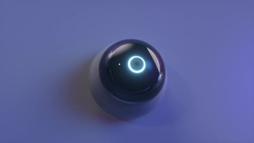 Rotating security camera with AI recognition installed on the wall. Surveillance system