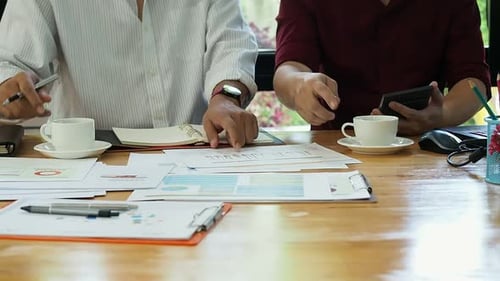 Businessmen financial inspector and secretary calculating balance.