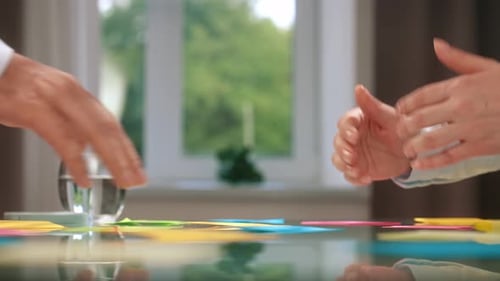 Business Agreement Handshake Over a Modern Conference Table