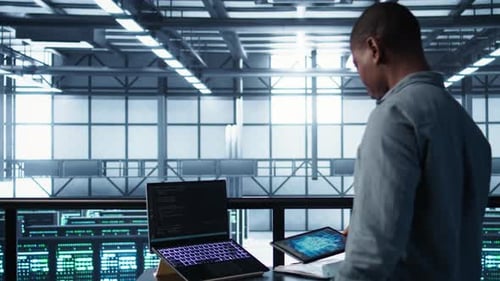 Server Farm Employee Using Artificial Intelligence Tech on Devices