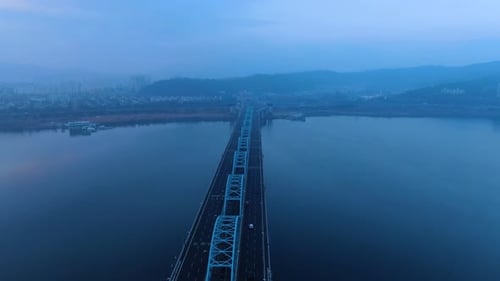 the traffic conditions on the bridge in the early morning.