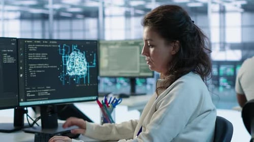 Portrait of Smiling Technician Programming in AI Data Center