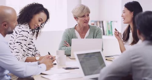 4k video footage of a group of businesspeople having a meeting in a modern office