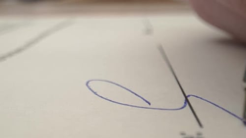 Signing Legal Document, Pen Writing Signature Close-Up