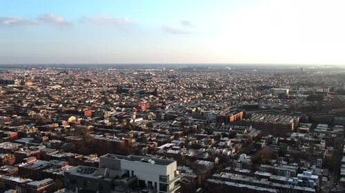 Wide aerial panorama of large city in America, downtown with modern skyscrapers surrounded by tradit
