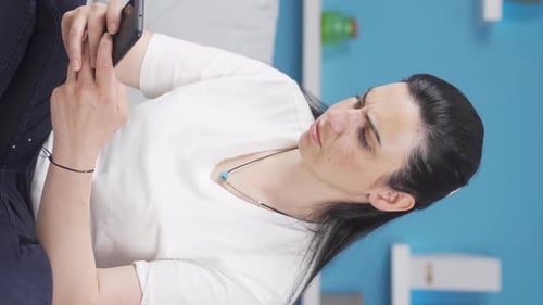 Woman Using Smartphone and Drinking Water