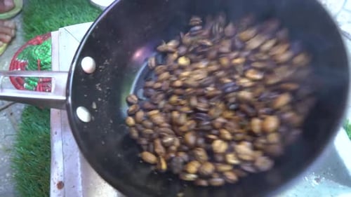 Roasting Ethiopian coffee during a coffee ceremony in Addis Ababa, Ethiopia