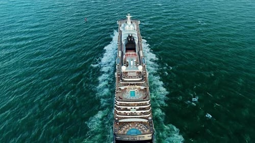 Luxury Cruise Liner Goes to the Horizon Above Aerial View of Luxury Cruise in the Ocean