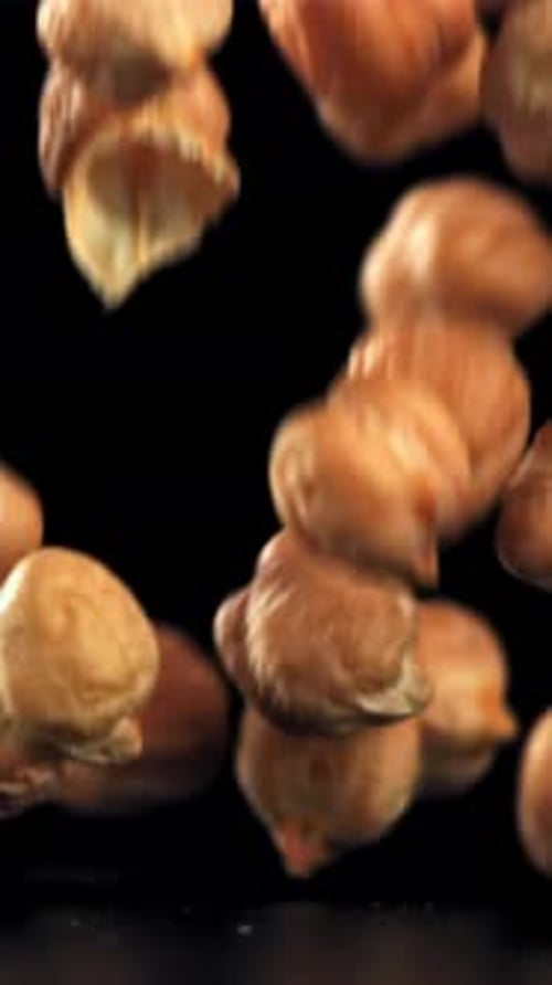 Chickpeas Fall on the Table Filmed on a Highspeed Camera at 1000 Fps