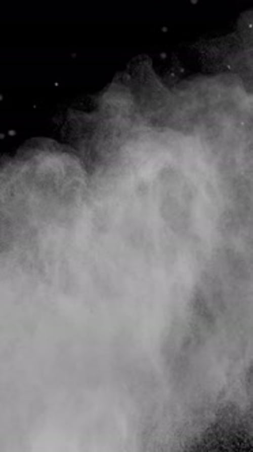 Super Slow Motion Shot of White Color Powder Explosion at 1000Fps Vertical View