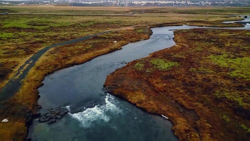 Aerial View of Arctic Oxarafoss Cascade