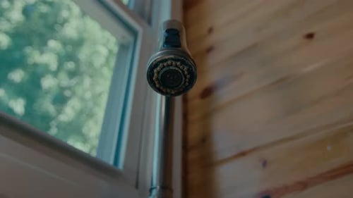 Kitchen Sink Sprayer Near Window in Home