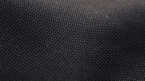 Macro View of Textured Black Fabric Material