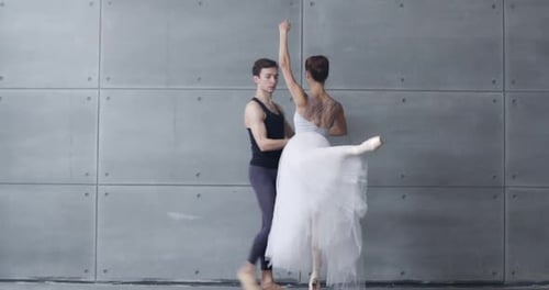 Elegant Ballet Couple Dancing in Studio
