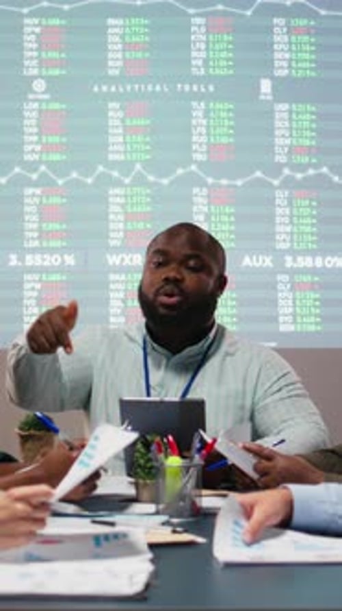 Confident Man Leading Workplace Presentation