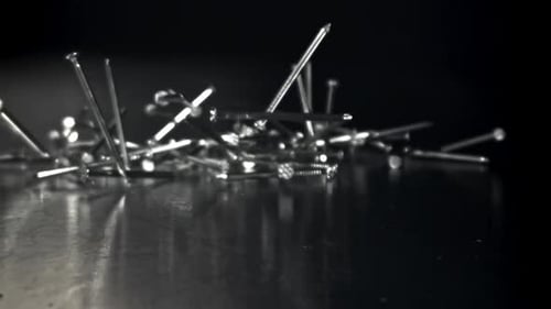 Nails Fall on a Metal Table Filmed on a Highspeed Camera at 1000 Fps