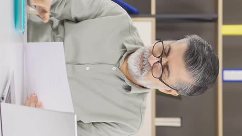 Vertical video of A company that is not doing well, a crisis.