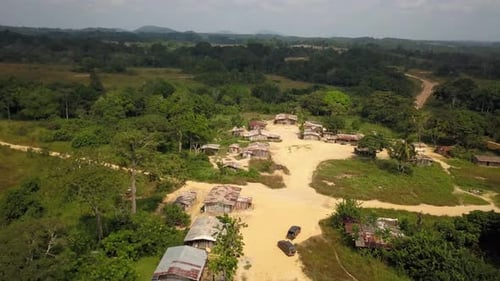 Drone view of a small village with shacks in the rainforest of Gabon, Africa.