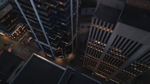 Top View Skyscraper Office Building at Night Worker Working overtimeHalifax