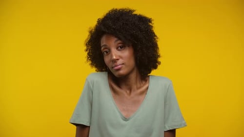 Adult Woman With Curly Hair Posing in Studio