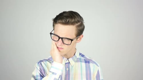 Young Man Having Toothache Pain White Background