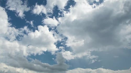 Time Lapse of White Clouds Drifting in Blue Sky