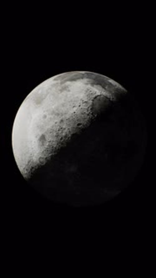 View of the Partially Sunlit Moon From Space Vertical