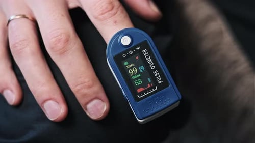 Pulse Oximeter Measuring Blood Oxygen on Finger