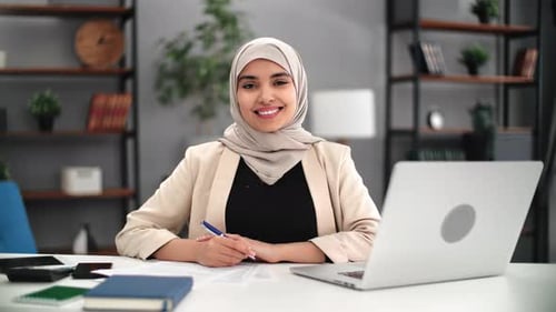 Portrait Smiling Mixed Race Business Woman Hijab Posing at Modern Workplace Laptop Desk Home Office