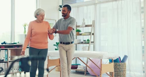 Senior Woman Receiving Physical Therapy Assistance