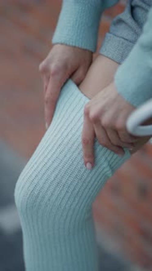 Woman Fixing High Socks Intimate Moment Intimate Fashion Concept Detail