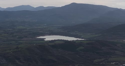 Aerial view of lake and mountains, Italy.